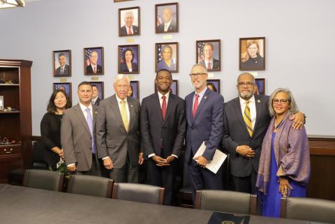 From left to right: Rep. Grace Meng (NY-06), Rep. Darren Soto (FL-09), Rep. Steny Hoyer (MD-05), Deputy Secretary Wally Adeyemo, Rep. Jared Huffman (CA-02), Rep. Troy A. Carter (LA-02), Rep. Robin L. Kelly (IL-02).