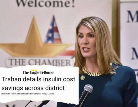 Trahan speaking with an article headline