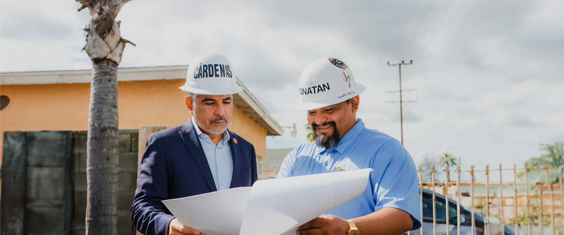 Cardenas looking at blueprint of solar projects going up in California.