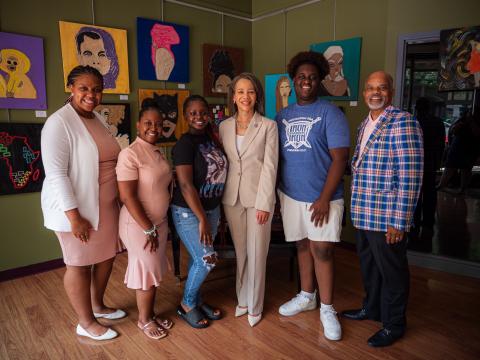 Rep. Lisa Blunt Rochester standing with local leaders at the Christina Cultural Arts Center (CCAC).